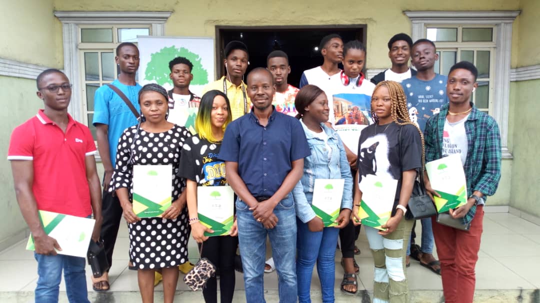 Programme facilitators and participants holding certificates from the CBF Summer Holiday Skills Development Programme