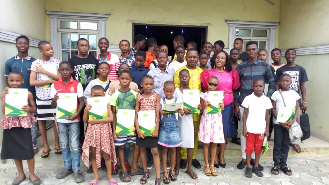 Group of participants and staff posing with certificates at the CBF Summer Holiday Skills Development Programme